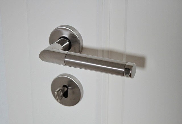 White door with lever-type handle