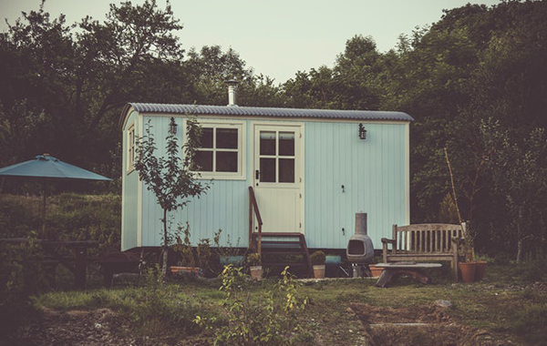 Tiny house with powder blue walls