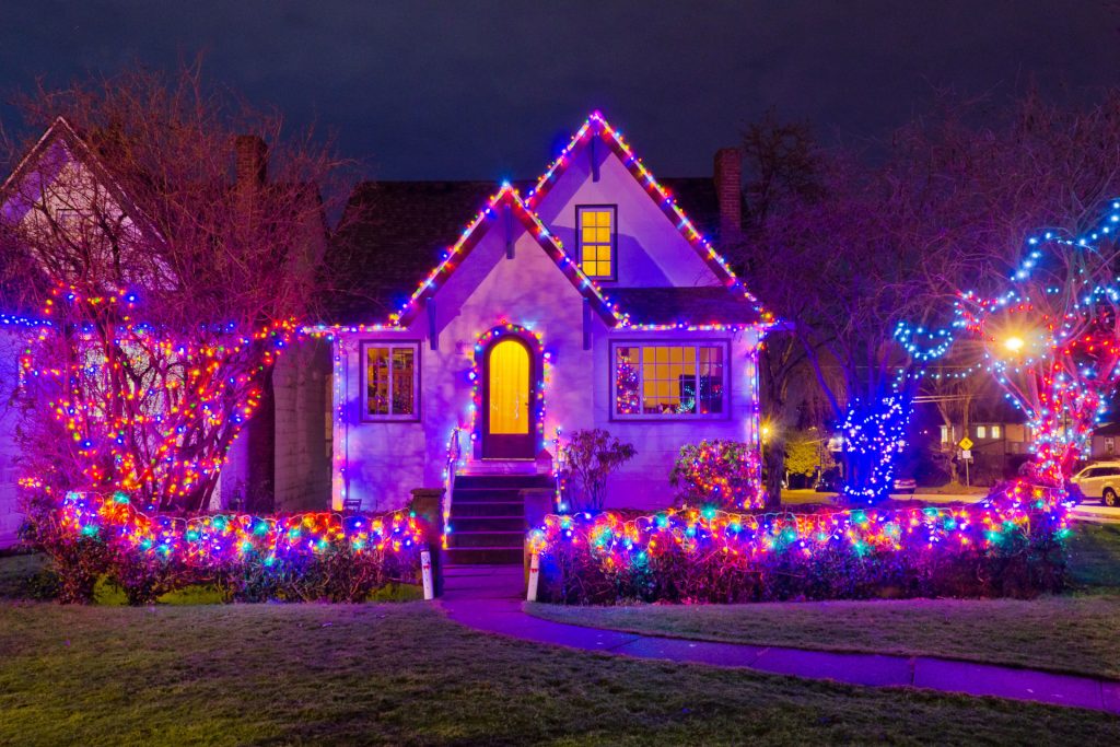 House decorated with colourful Christmas lights