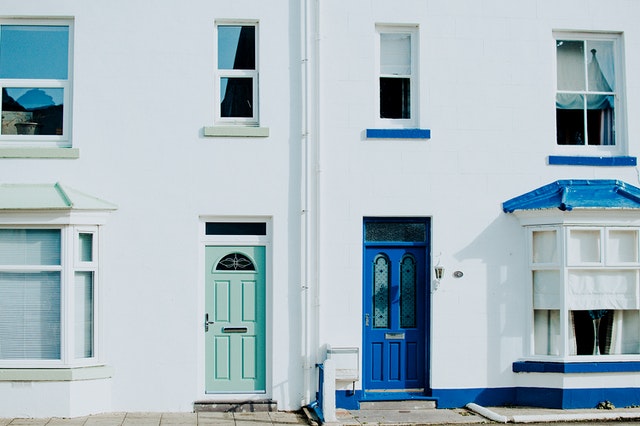 Houses with turquoise and blue door