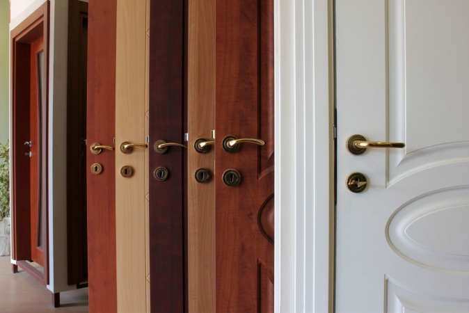 A collection of wood doors in various colours