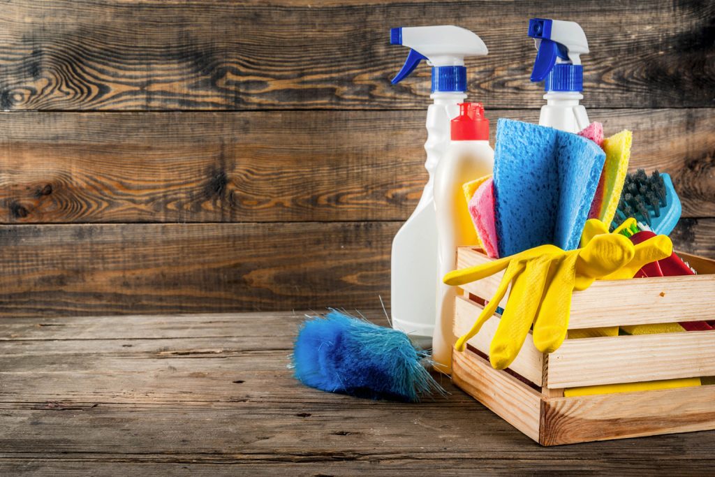 Cleaning supplies in a wooden box