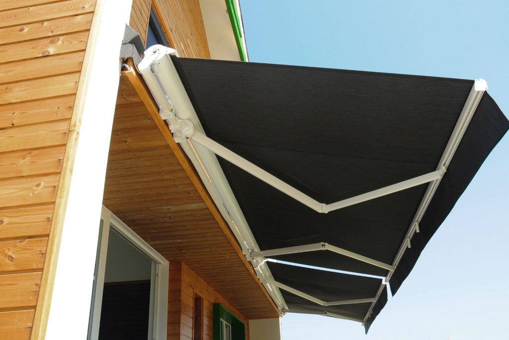 Black full cassette awnings drawn to block sunlight