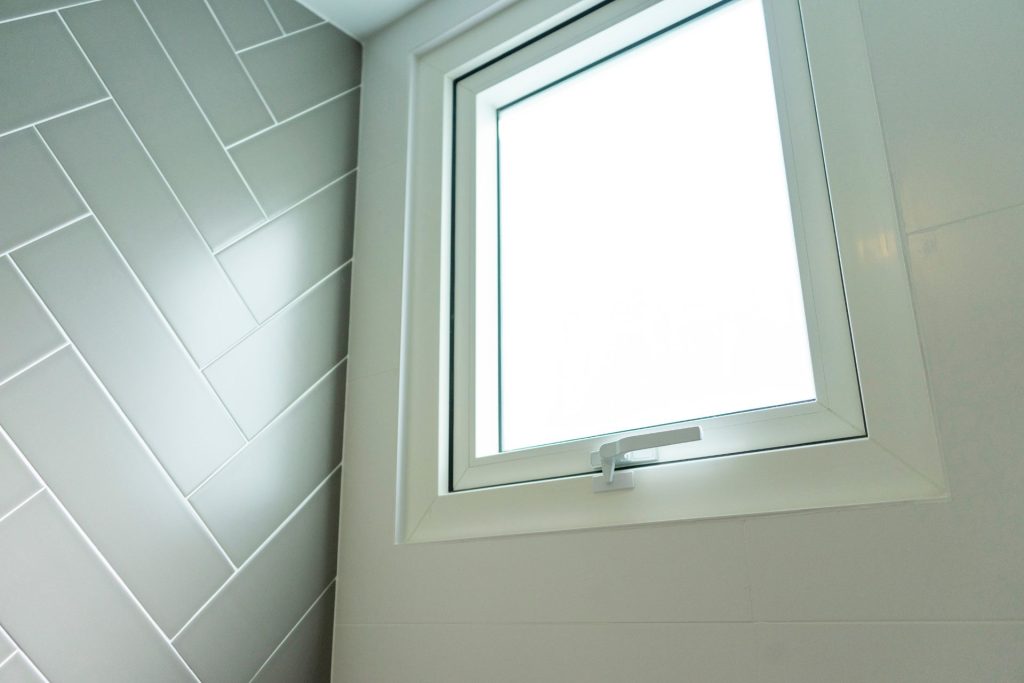 A white vinyl awning window 