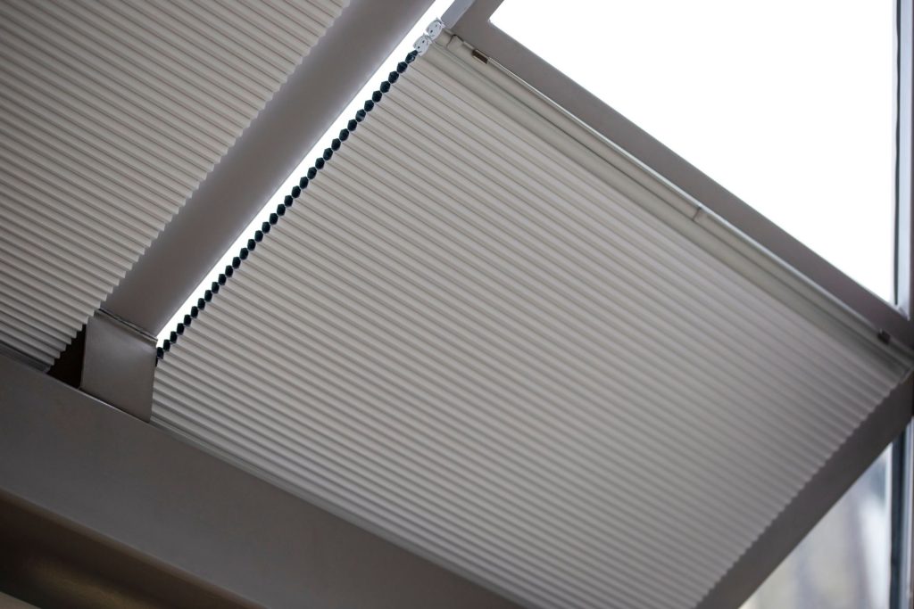 Motorized cellular shades on a skylight