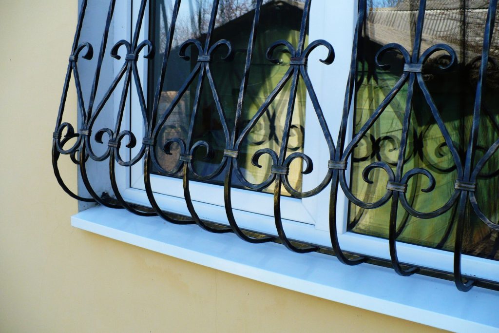 A sliding window with decorative grilles