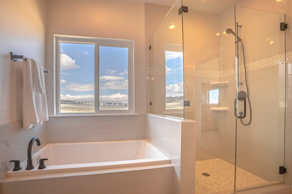 A bathroom with a sliding window