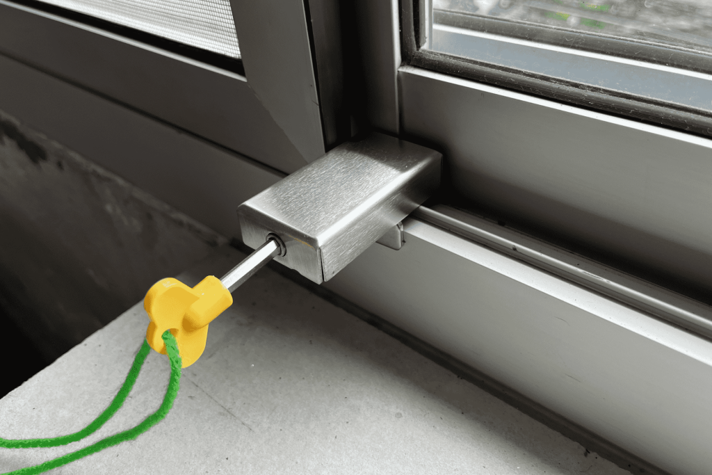 Close-up of sliding window lock