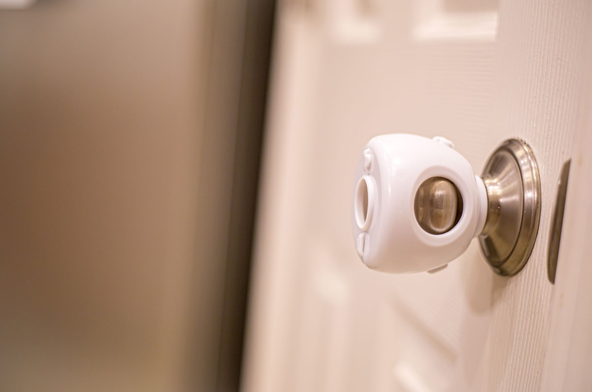 An interior door handle with a door knob cover