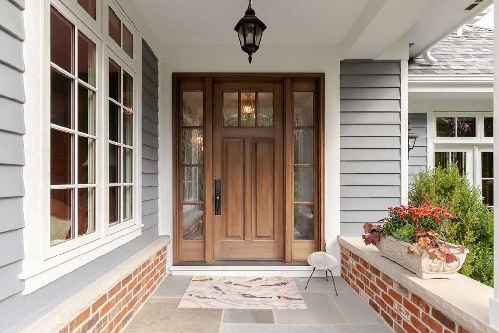 Custom wood doors with sidelights and transom windows